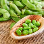 bigstock-edamame-or-soybeans-in-a-woode-375183415